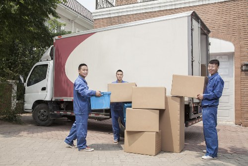 Removal van and movers in a Notting Hill residential street