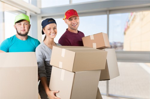 Removal team planning a house move on a Notting Hill street