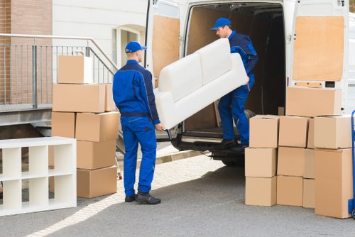 Removals team planning a move in a Notting Hill street