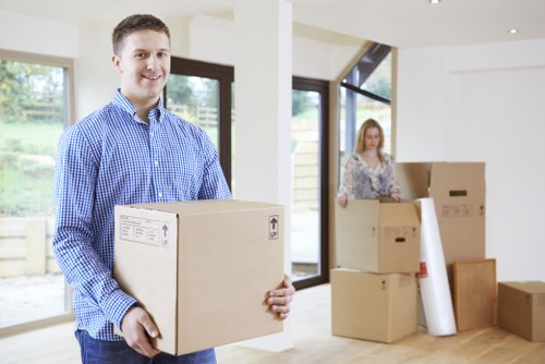 Moving truck and removal crew during a residential relocation