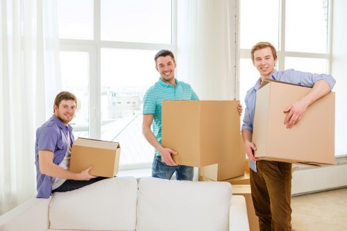 Packed moving boxes and labels ready for a local move in Notting Hill