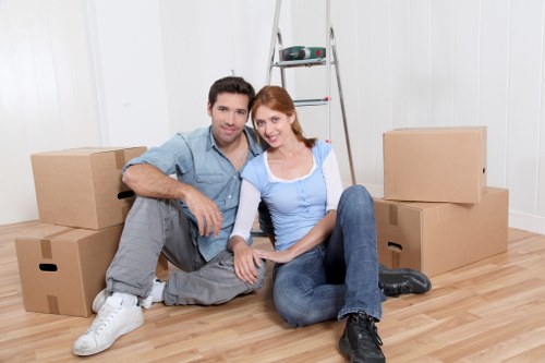 Loading boxes into a removal truck in west London