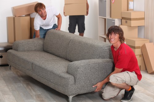 Careful loading of household items into a van