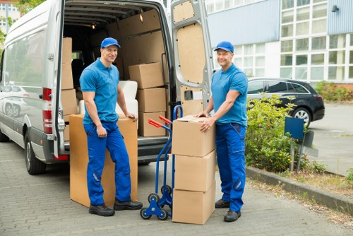 Removal team helping with a move in Notting Hill streets