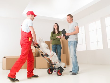 Local moving team planning access on a Notting Hill road