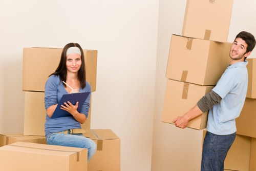 Local removals team handling furniture for a Notting Hill customer